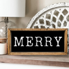 Black and white MERRY sign.