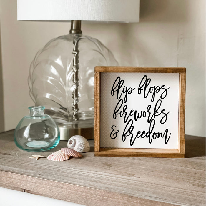 Flip flops, fireworks and freedom sign. Summer sign, patriotic sign.